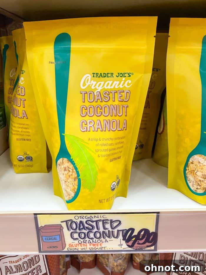 A bag of Trader Joe's toasted coconut granola, a crunchy and flavorful gluten-free snack or breakfast topping.
