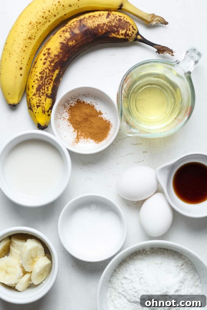 Bananas with other ingredients. A collection of raw ingredients, including ripe bananas, eggs, and a bowl of flour, ready for baking.