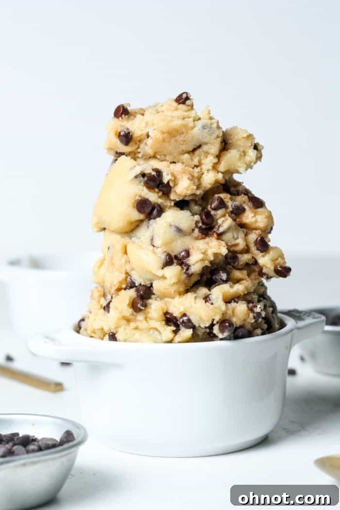 Close-up of creamy gluten-free and vegan cookie dough with chocolate chips.