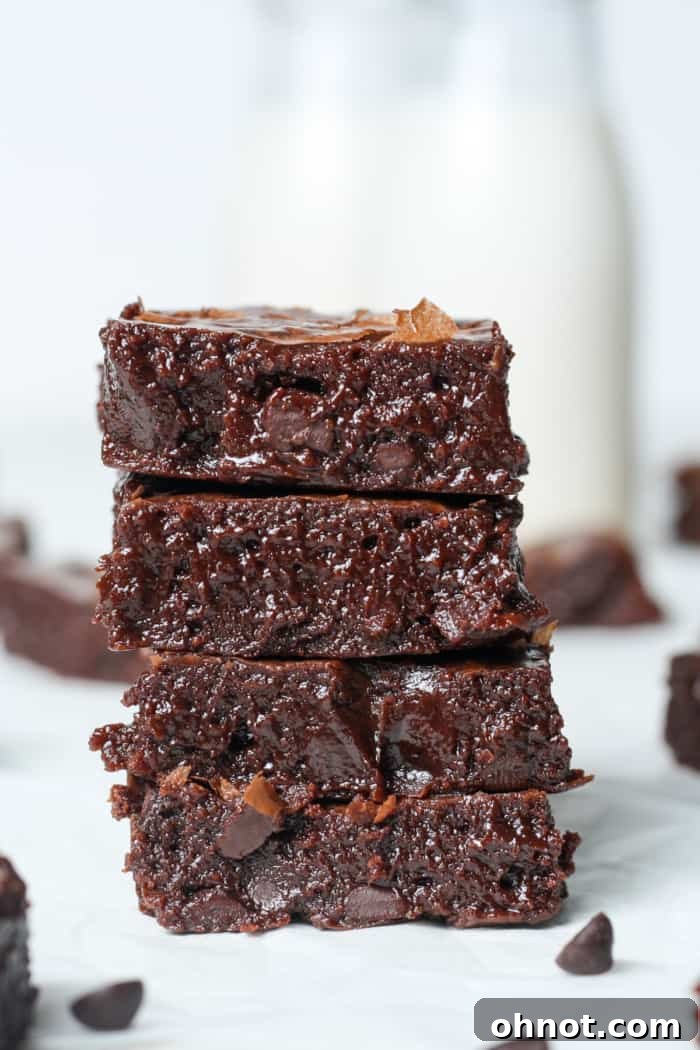 Irresistibly fudgy dairy free brownies, freshly baked and ready to be enjoyed.