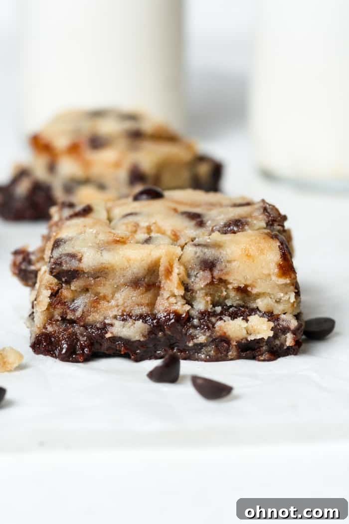 Close-up of gooey cookie dough brownies, showing the rich, soft layers.