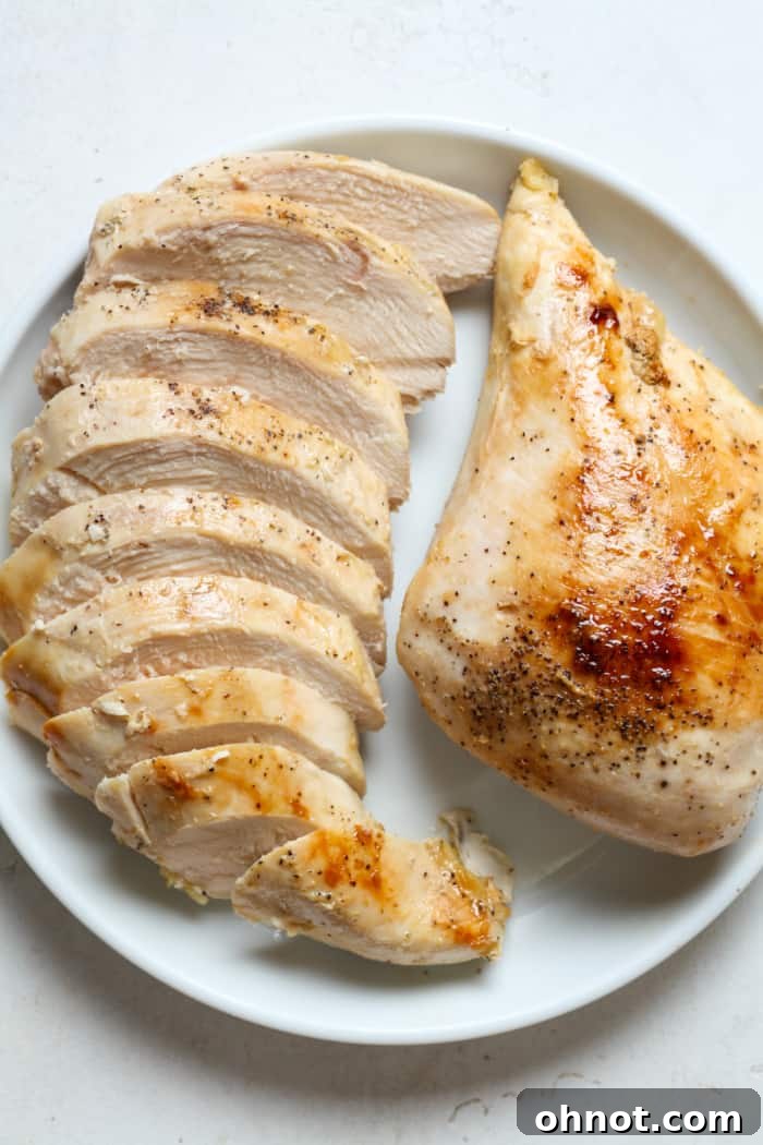 Chicken breast on plate.