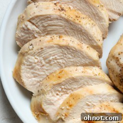 Sous vide chicken breast on plate.