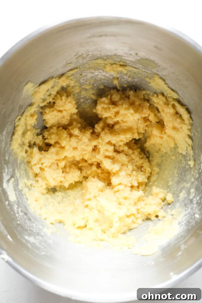 Yellow cookie dough in bowl.