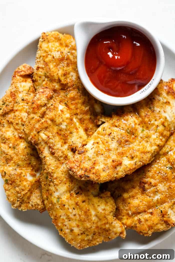 Crispy gluten-free chicken tenders perfectly plated and ready to serve.