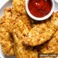 Gluten-free chicken tenders on a plate, ready to be enjoyed.