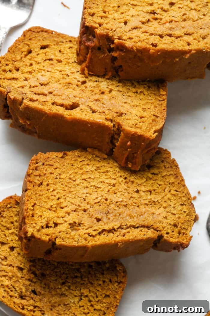 Perfectly cut slices of gluten-free pumpkin bread.