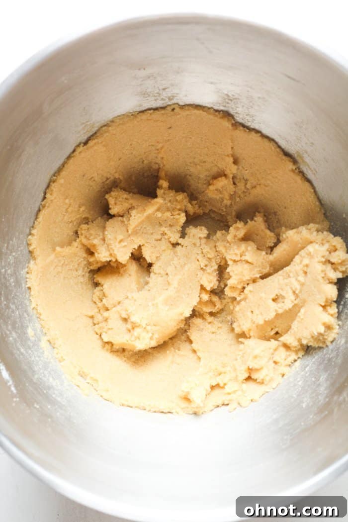 Creamy butter and sugar mixture after beating in a stand mixer.