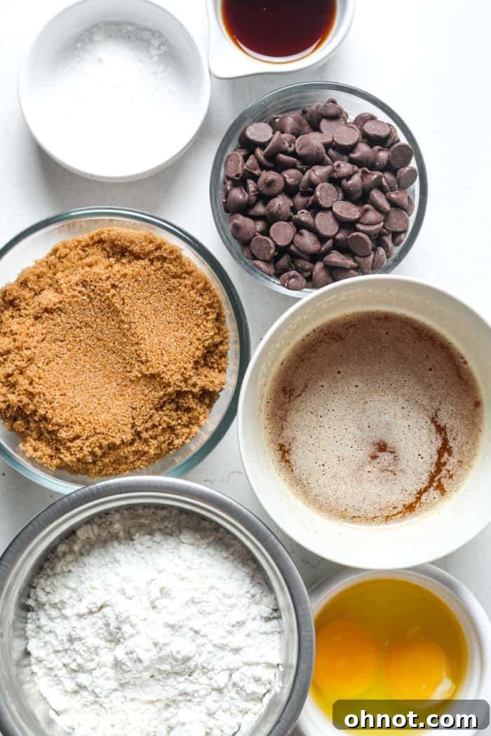 Various baking ingredients laid out for preparing blonde brownies.