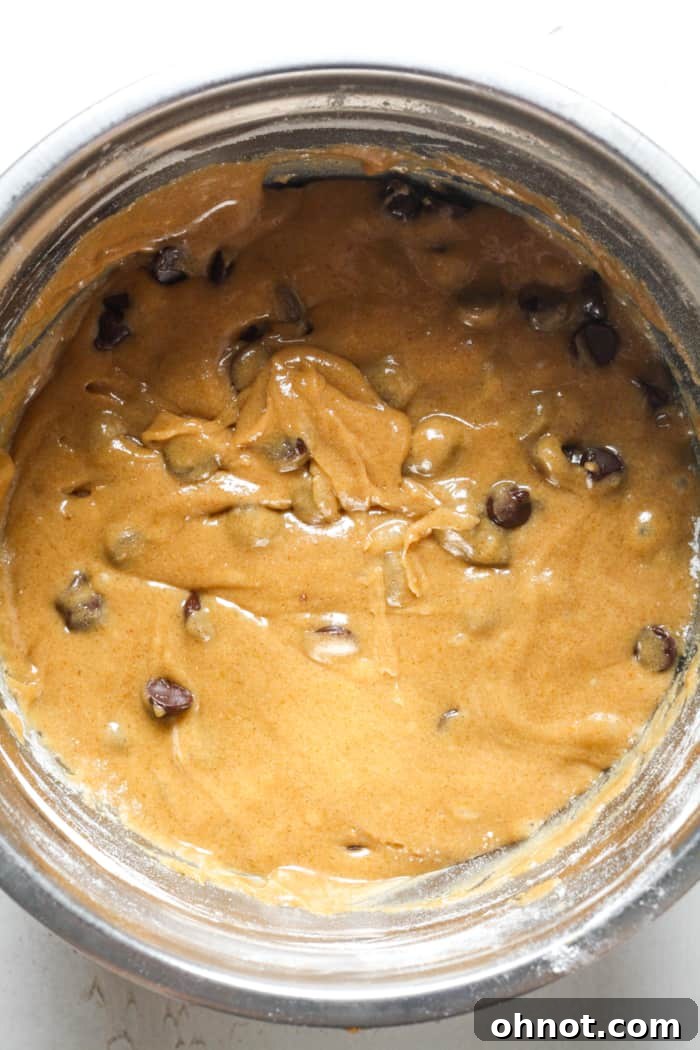 Blondie batter with chocolate chips folded in, ready for baking.