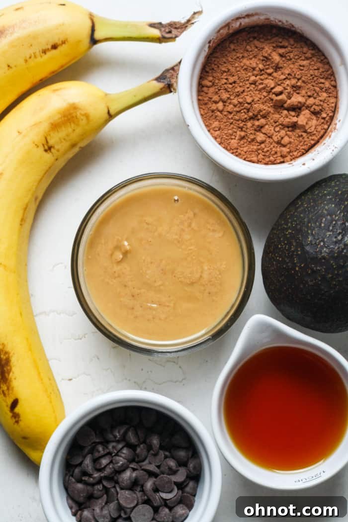 Fresh avocado, ripe bananas, and other healthy ingredients for brownies.