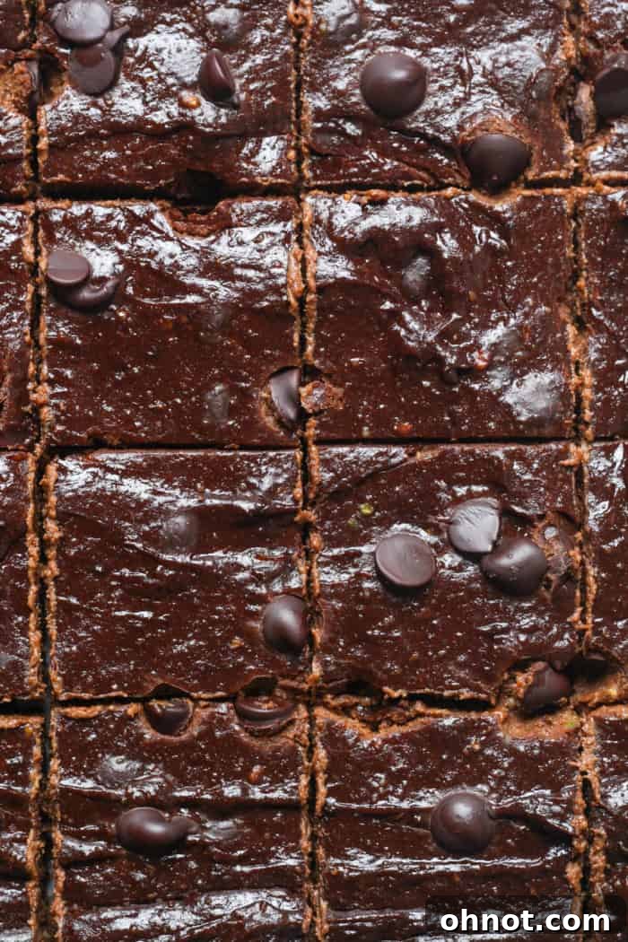 A stack of healthy vegan avocado brownies, showcasing their rich, fudgy texture.