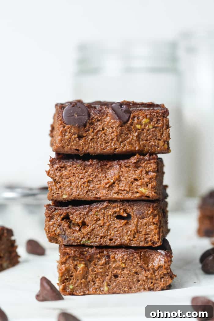 Beautifully stacked avocado brownies, tempting and delicious.