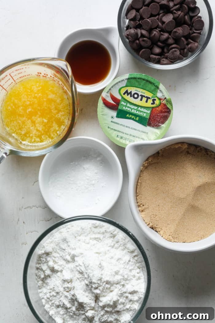 Applesauce and other baking ingredients laid out.