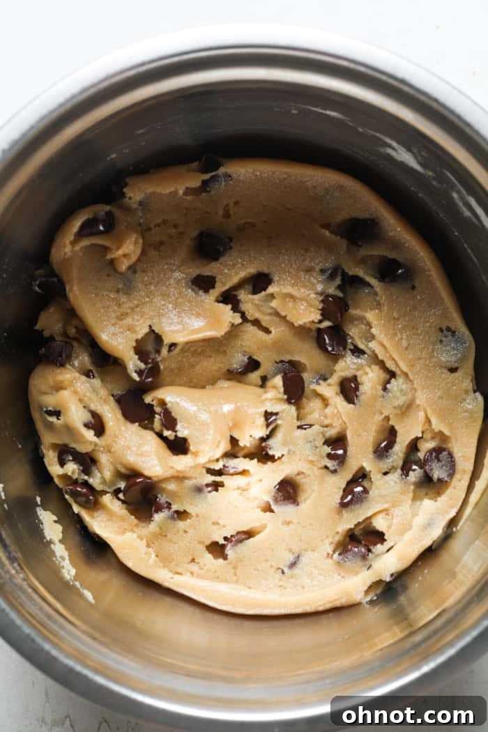 Vegan blondie dough with chocolate chips folded in.