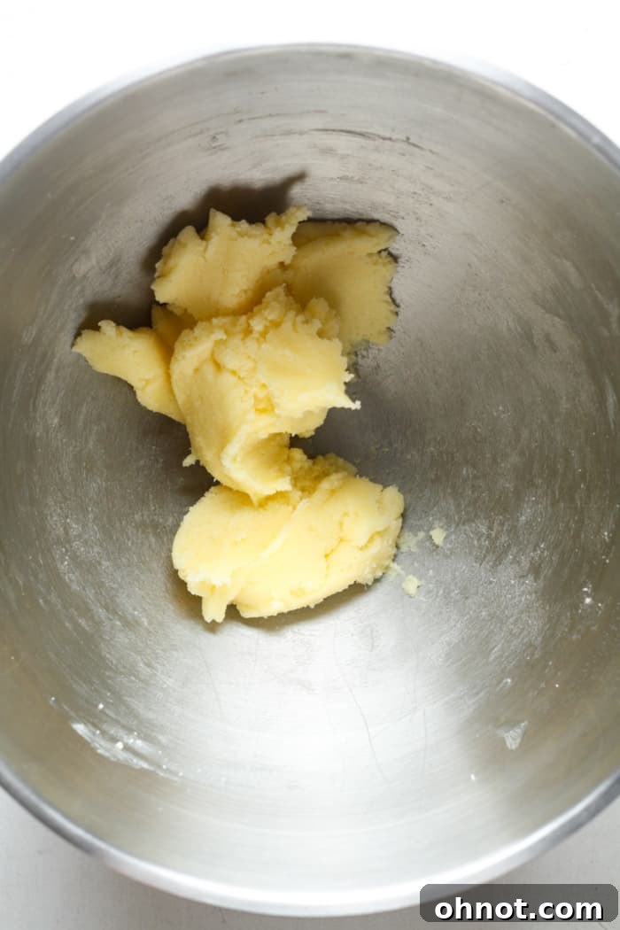 Vegan butter and sugar in bowl.