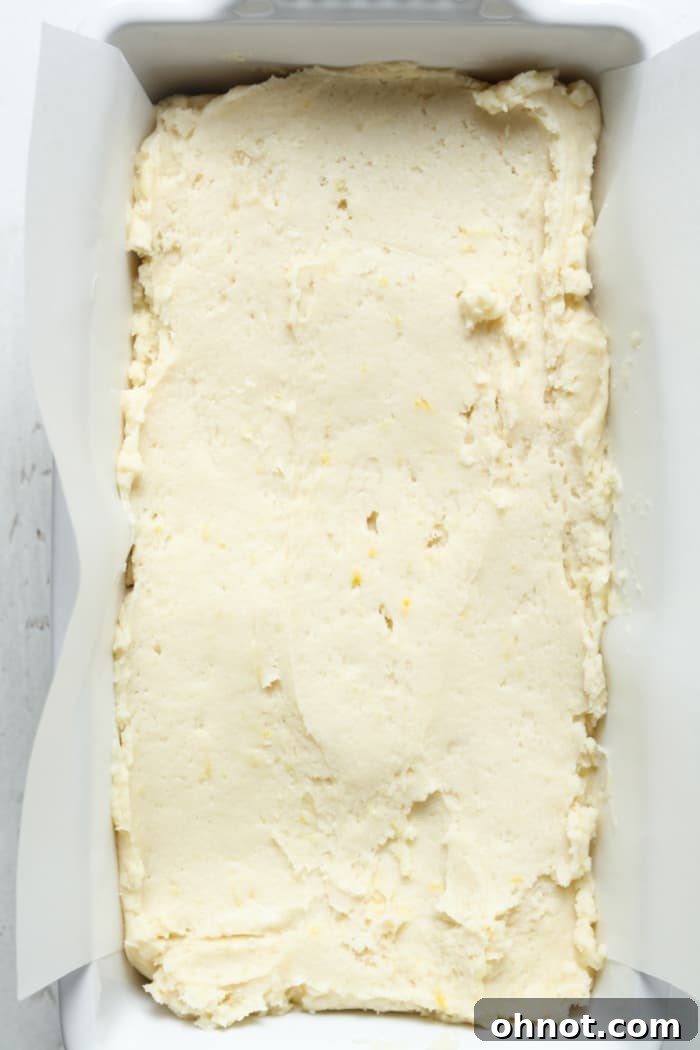 Unbaked pound cake in pan.