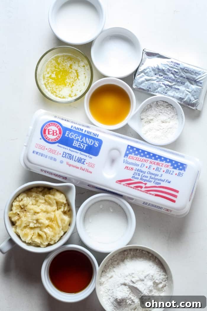 A collection of fresh ingredients for baking banana bread.