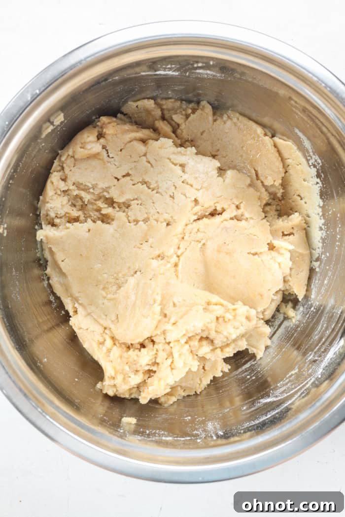 Light colored dough in bowl.