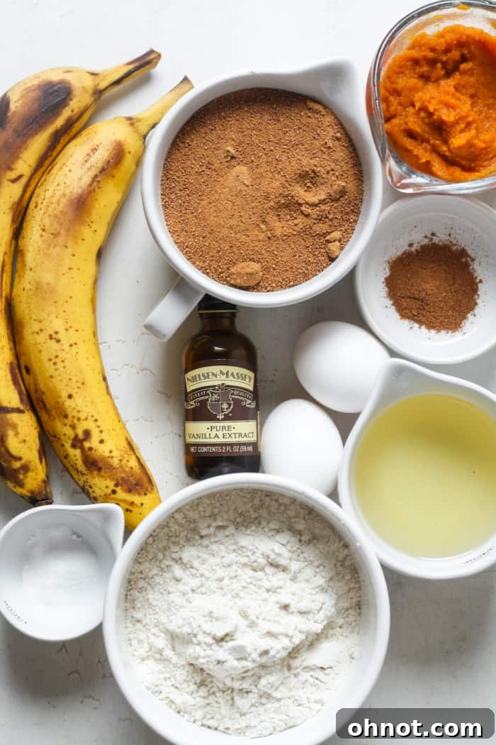 Close-up of fresh, ripe bananas next to a can of pumpkin purée, essential ingredients for homemade pumpkin banana bread.
