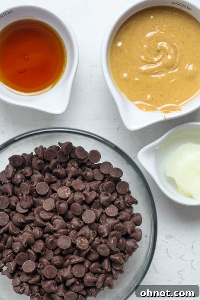 Ingredients for vegan peanut butter cups: chocolate, peanut butter, and maple syrup.