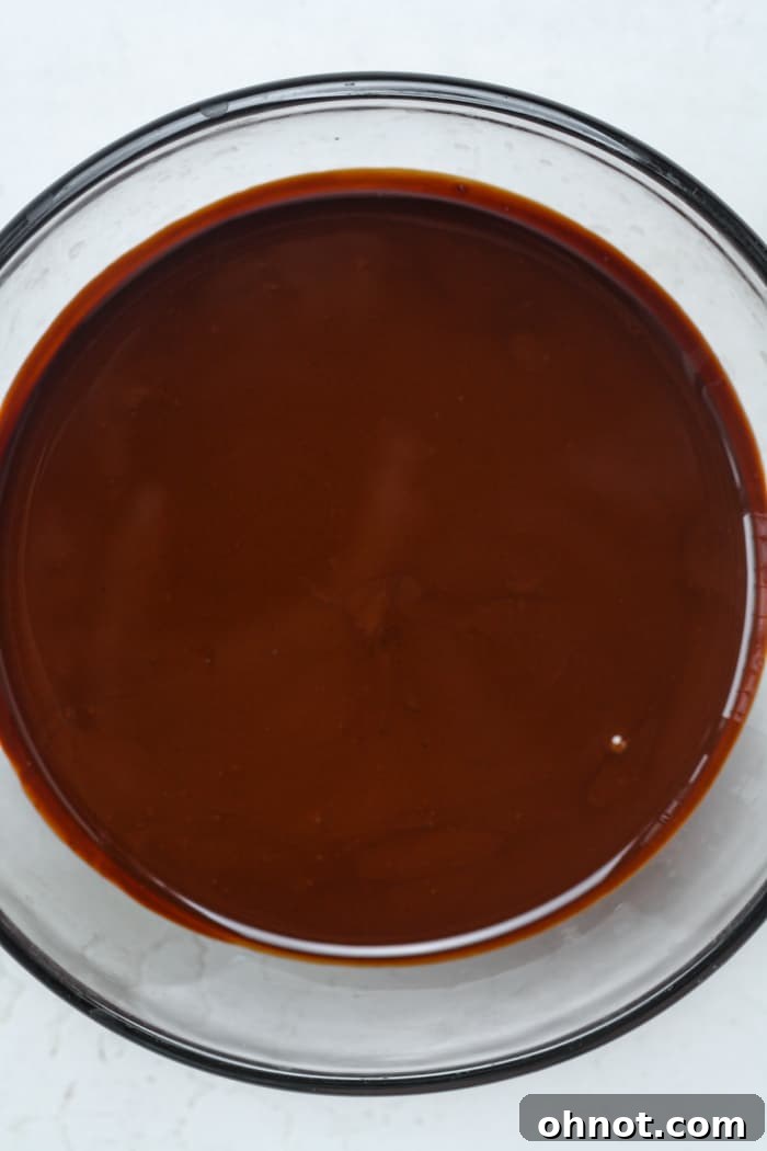 Melted chocolate and coconut oil in a bowl, ready for the next step.