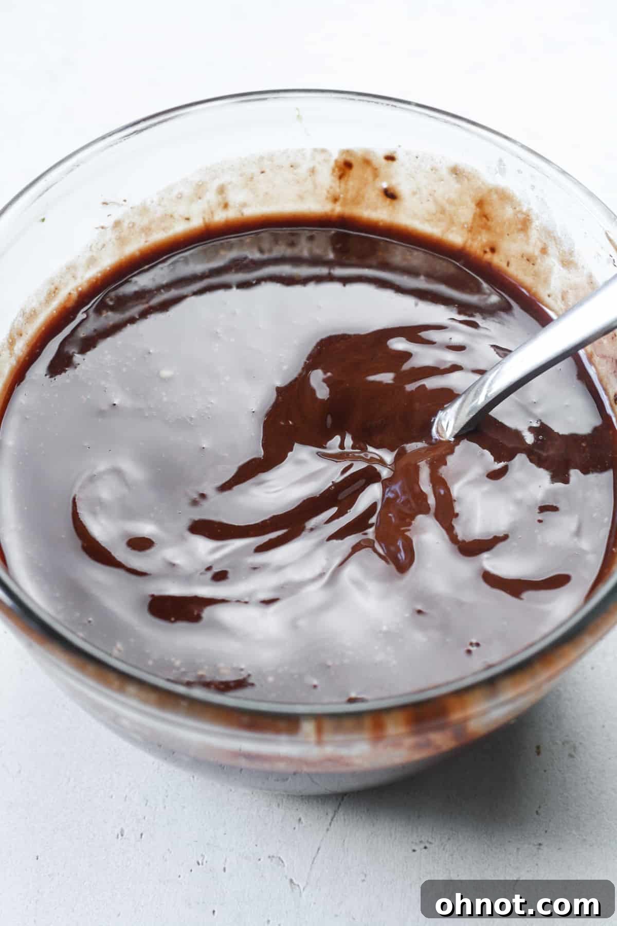 Smooth, creamy melted chocolate mixture in a bowl, ready for the next step.