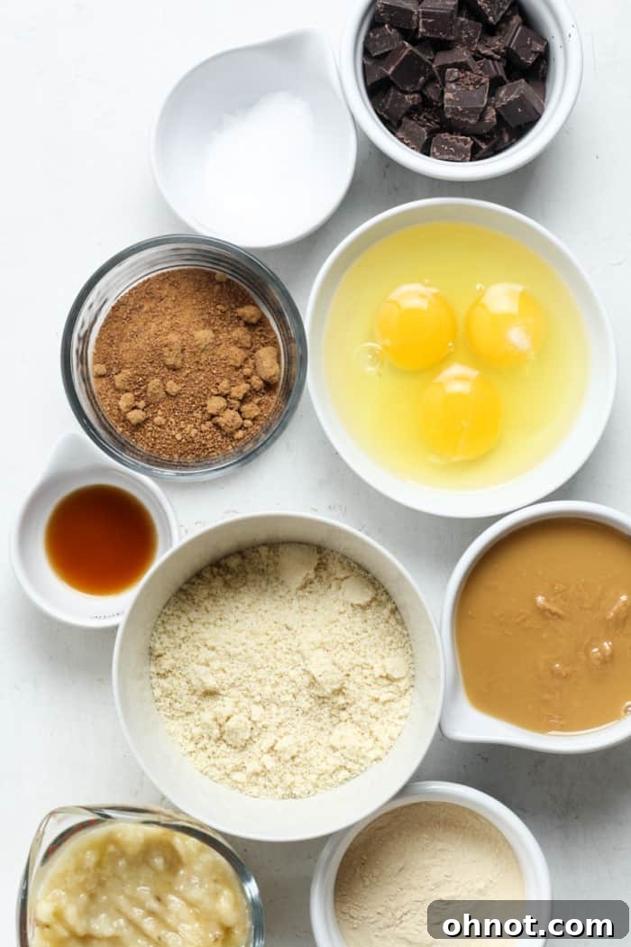Close-up of mashed bananas and other wet ingredients being mixed in a bowl for protein banana bread.