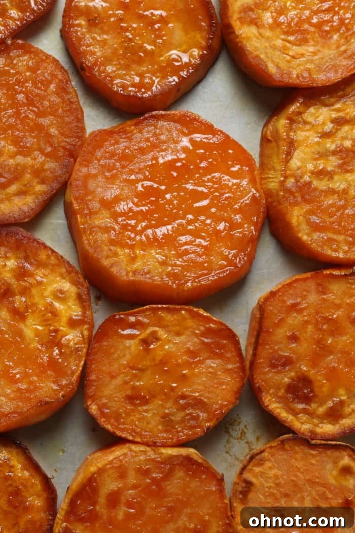 Baked sweet potato slices, perfectly caramelized and ready to serve.