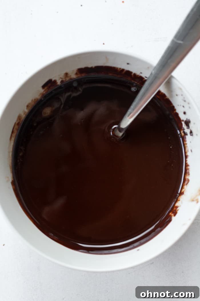 Smooth melted dark chocolate.