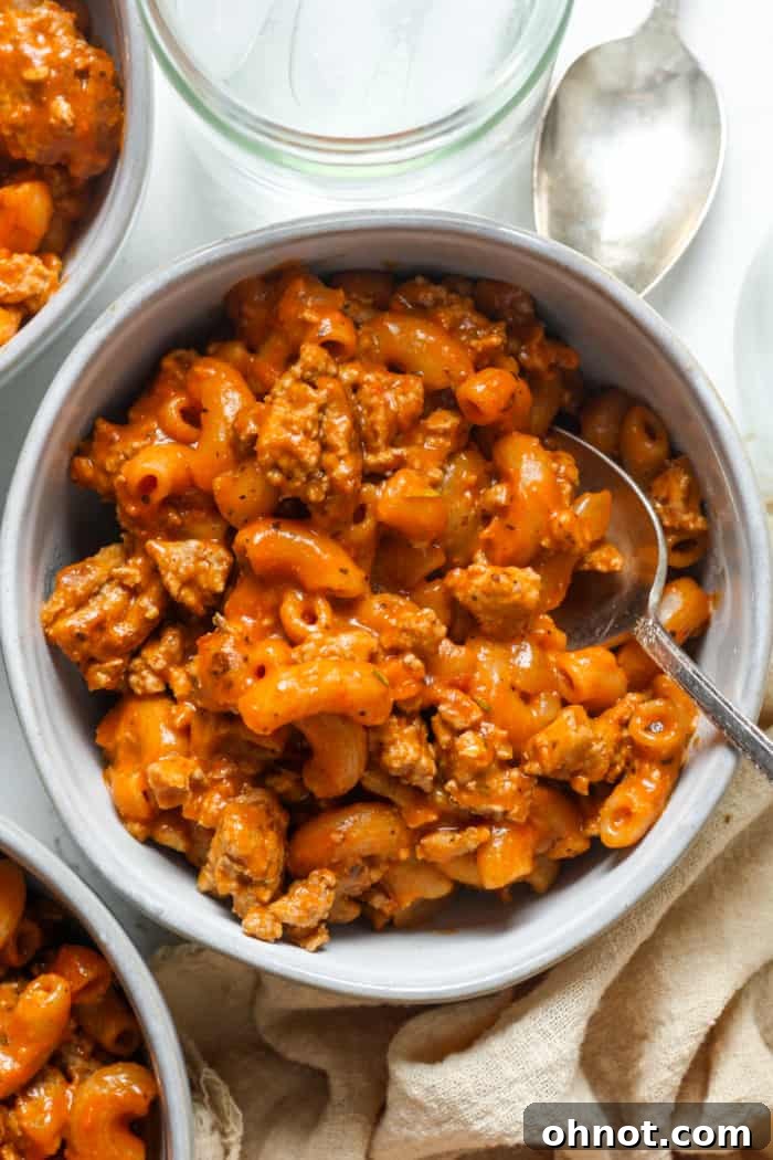 A comforting bowl of Healthy Hamburger Helper, showcasing a rich, creamy sauce, tender ground meat, and perfectly cooked pasta, ready to be enjoyed as a family-friendly meal.