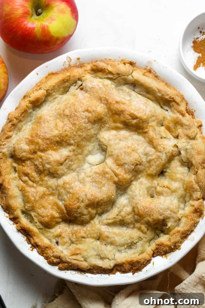 Freshly baked golden gluten-free apple pie.