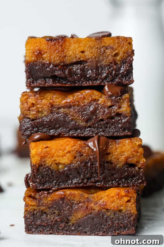A stack of perfectly baked and sliced pumpkin brownies.