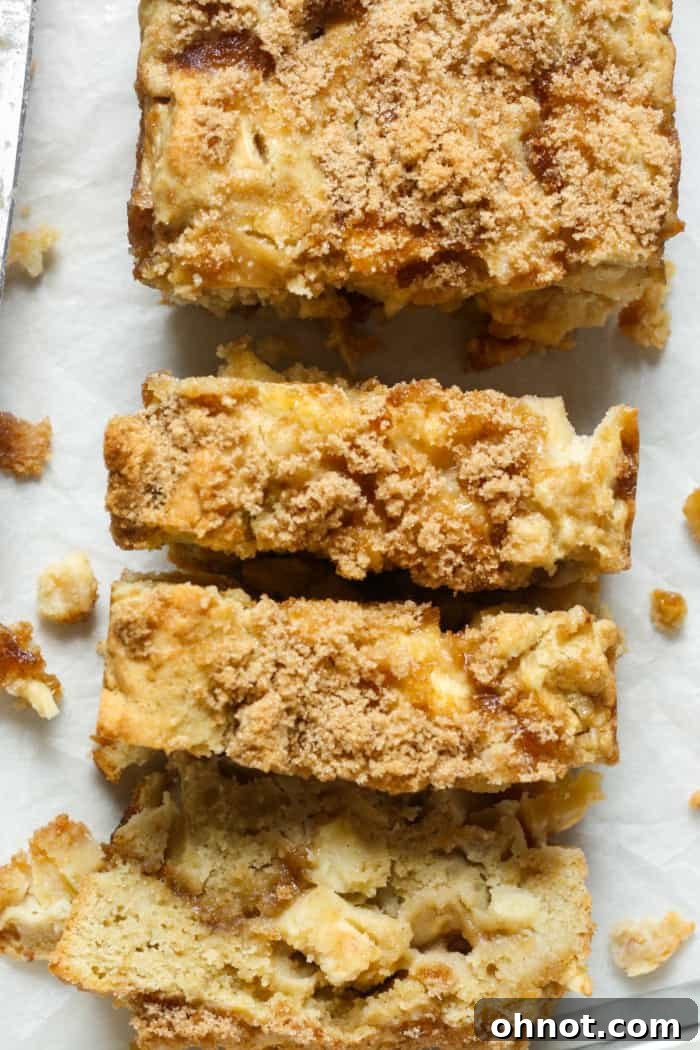 Freshly baked Apple Cinnamon Bread, sliced and ready to serve.