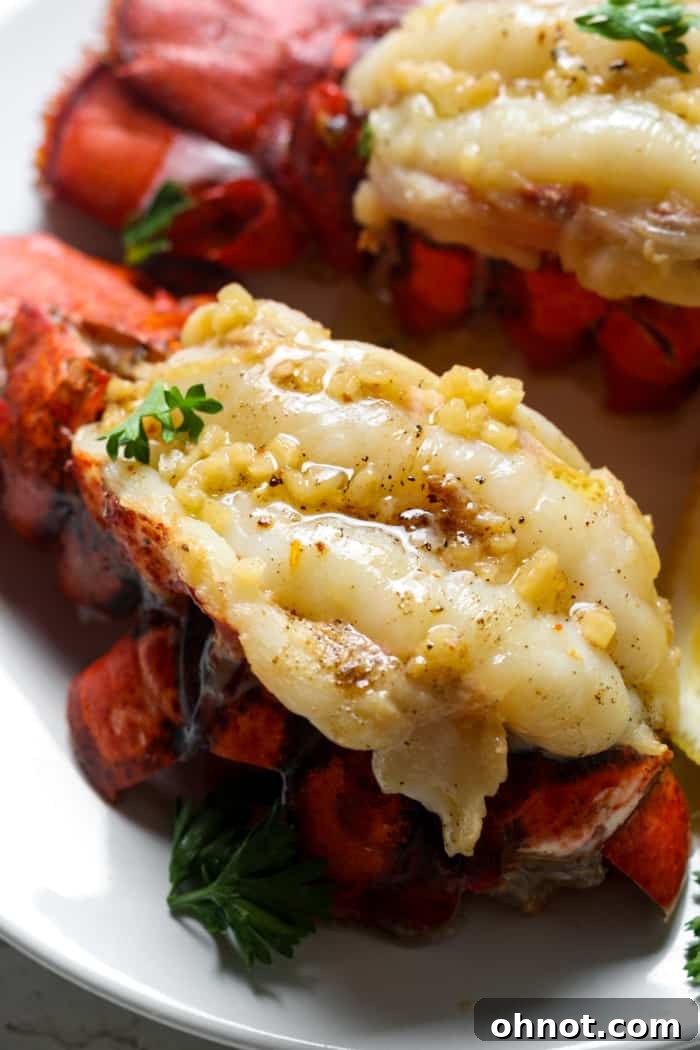 Close-up of butterflied lobster meat with garlic