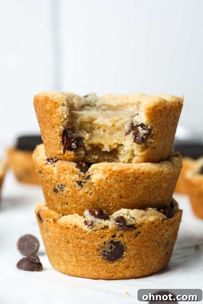 Gooey chocolate chip cookie muffins, freshly baked and ready to be filled.