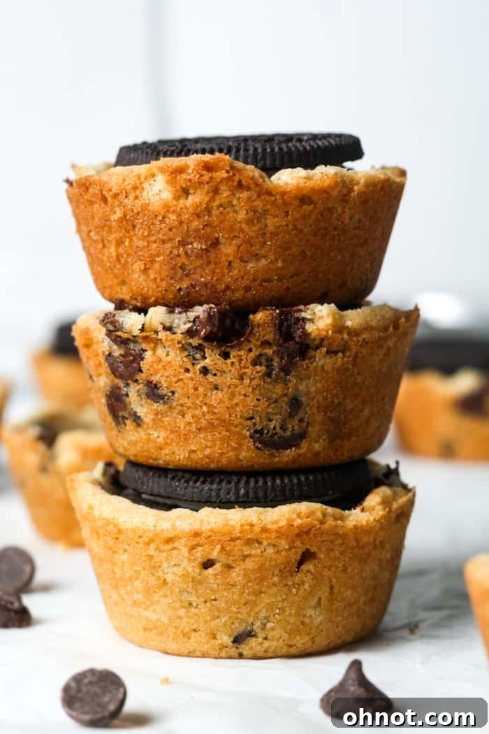 Decadent Oreo cookie cups, filled with creamy goodness and topped with cookie crumbles.