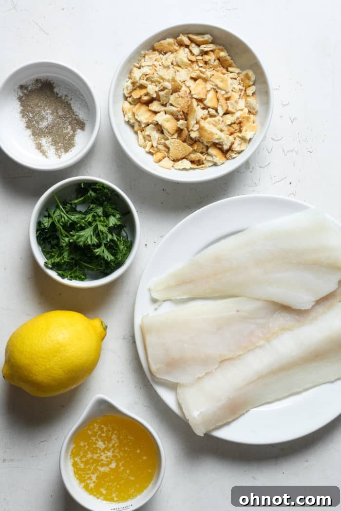 Fresh haddock fillets and ingredients ready for baking.