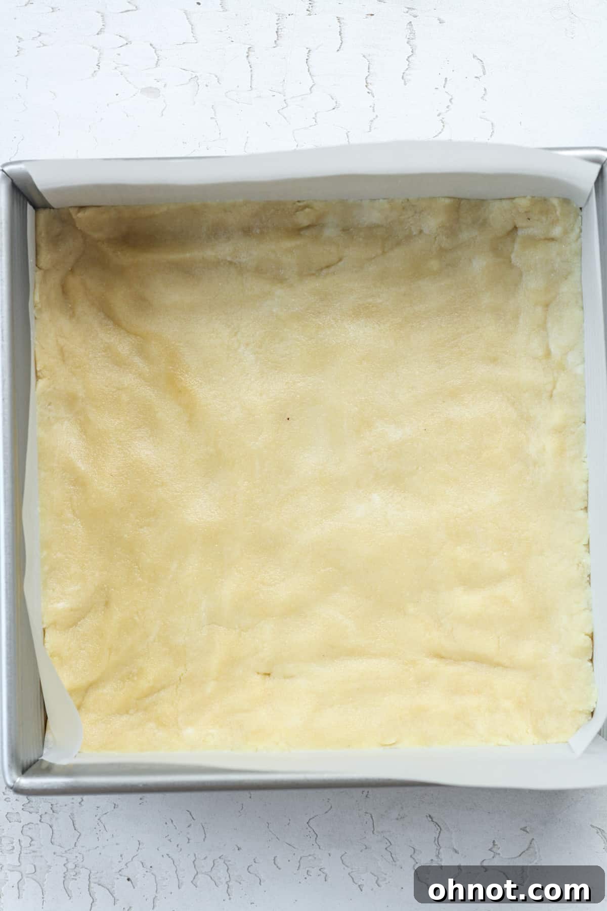 Shortbread crust in pan.