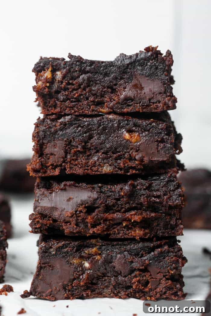 A tempting stack of healthy banana brownies, showing their rich color and inviting texture.