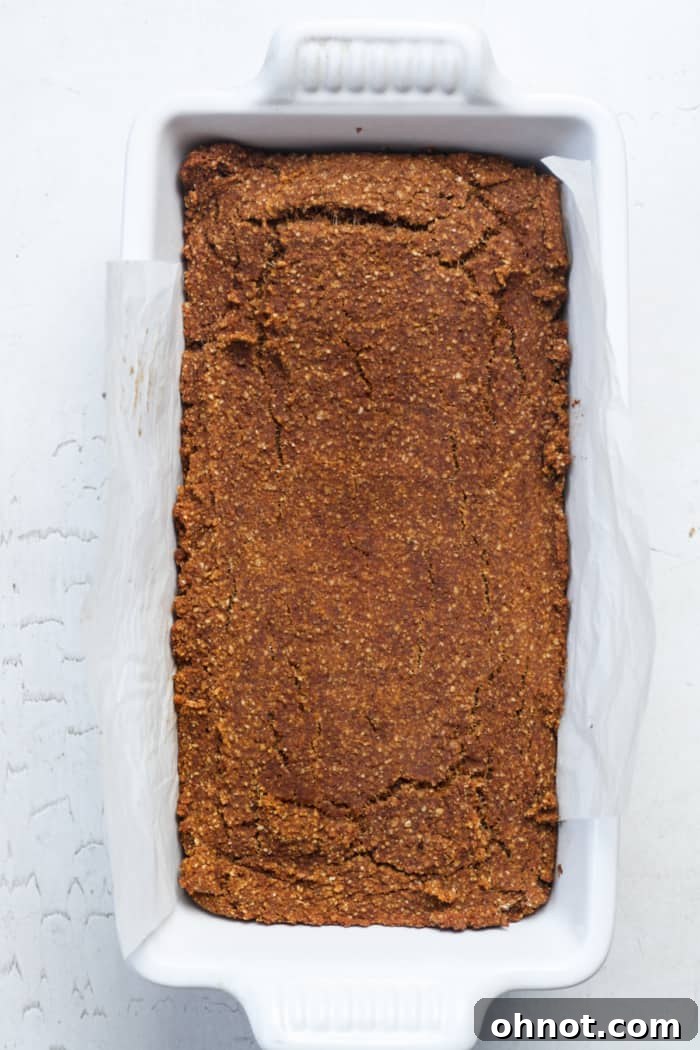 Freshly baked and golden brown healthy pumpkin bread loaf.