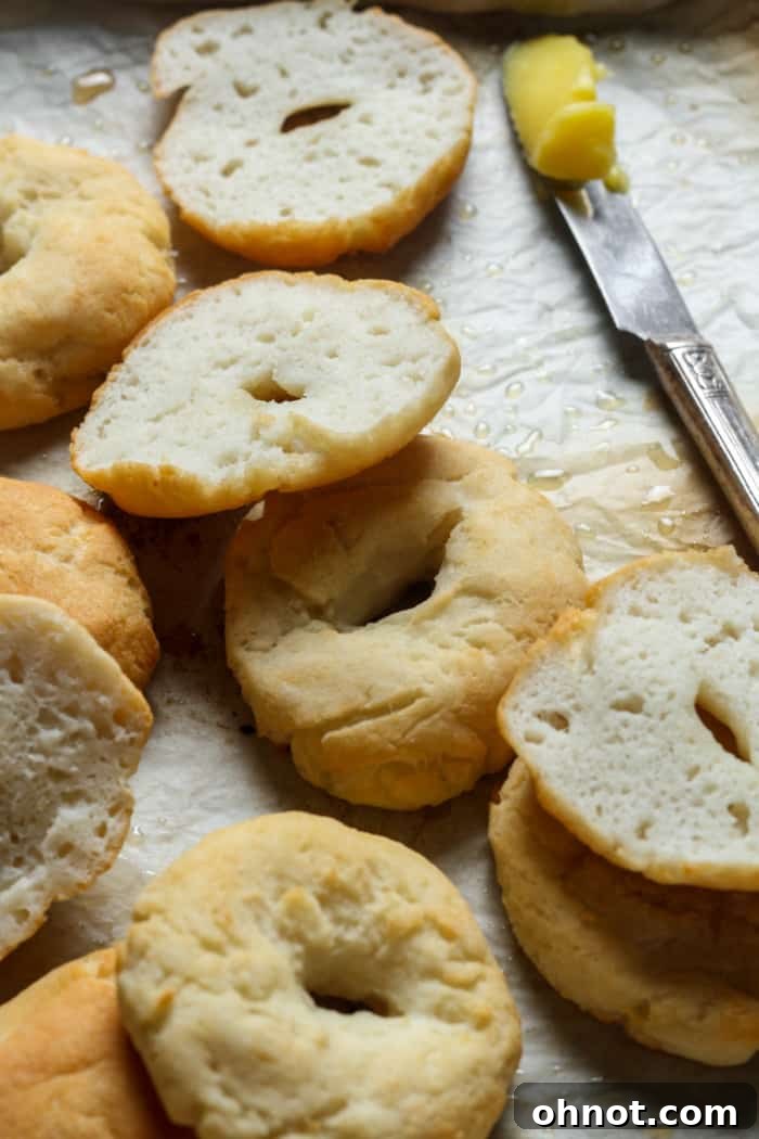 A stack of golden, yeast-free gluten-free bagels, ready to be enjoyed.