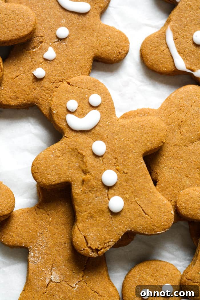 Festive vegan gingerbread cookies arranged on a platter, ready for holiday celebrations.