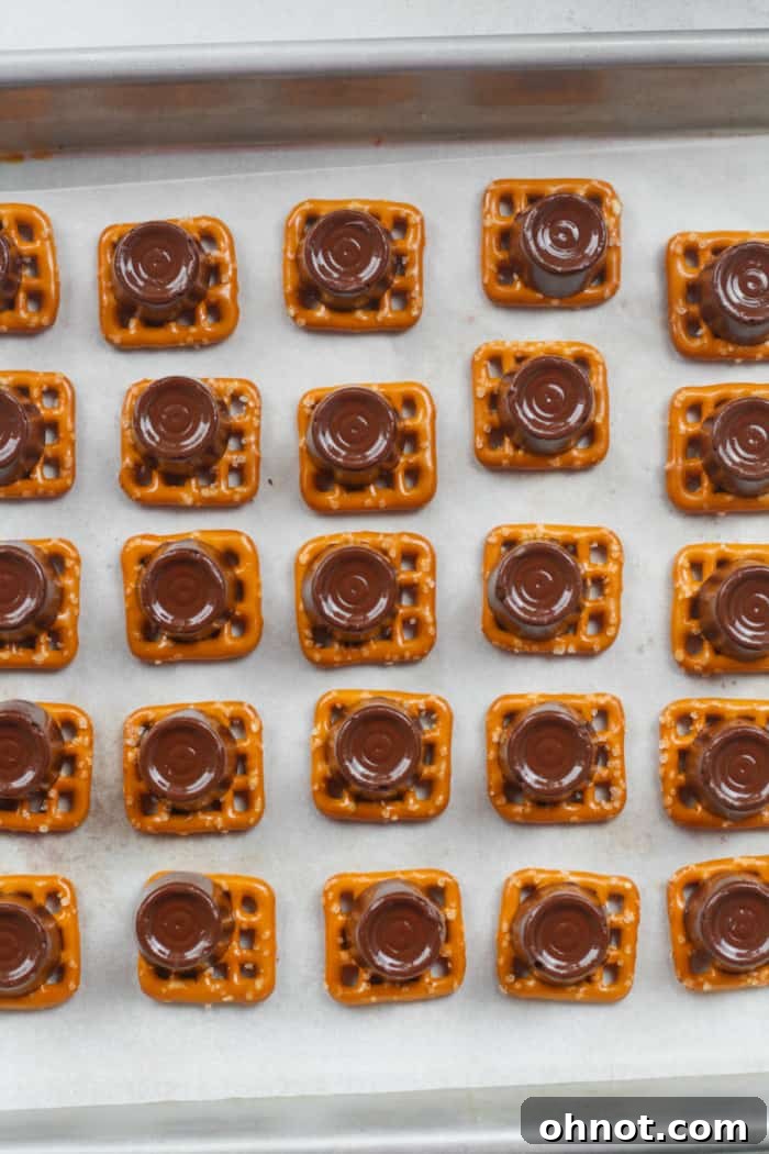 Gently melted Rolo candy on a pretzel.