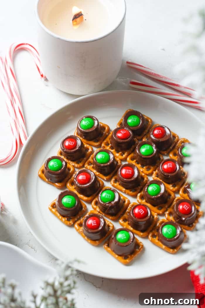 A festive plate showcasing a variety of Rolo pretzel bites.