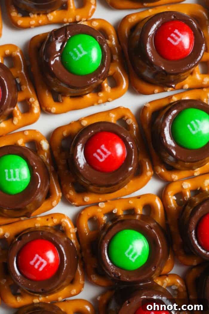 A close-up of festive chocolate pretzel bites.