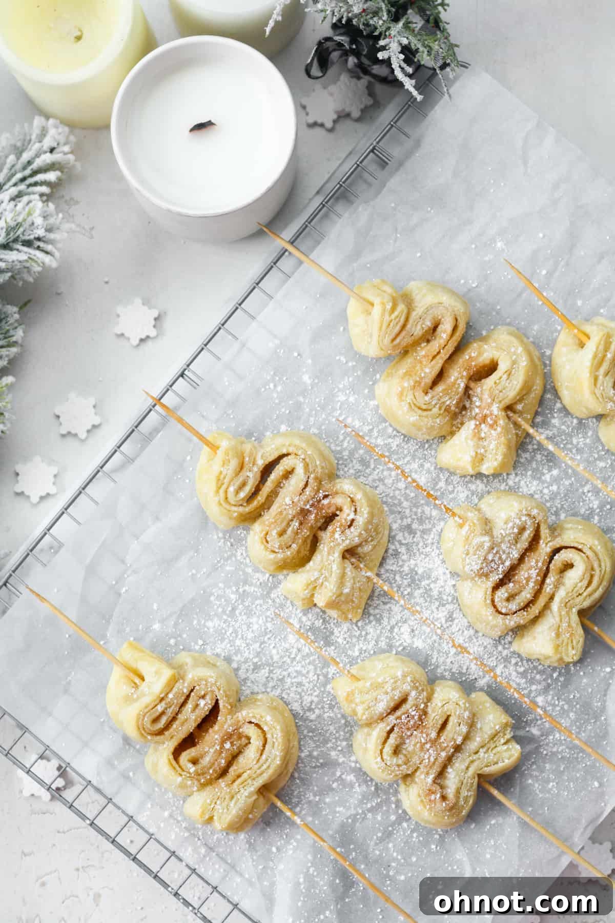 A close-up of a perfectly baked, golden puff pastry Christmas tree, a delightful winter treat.