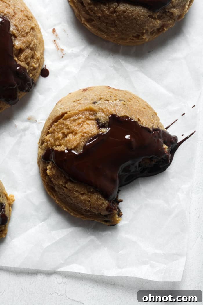 Sourdough chocolate chip cookies, baked to golden perfection with melted chocolate chunks.