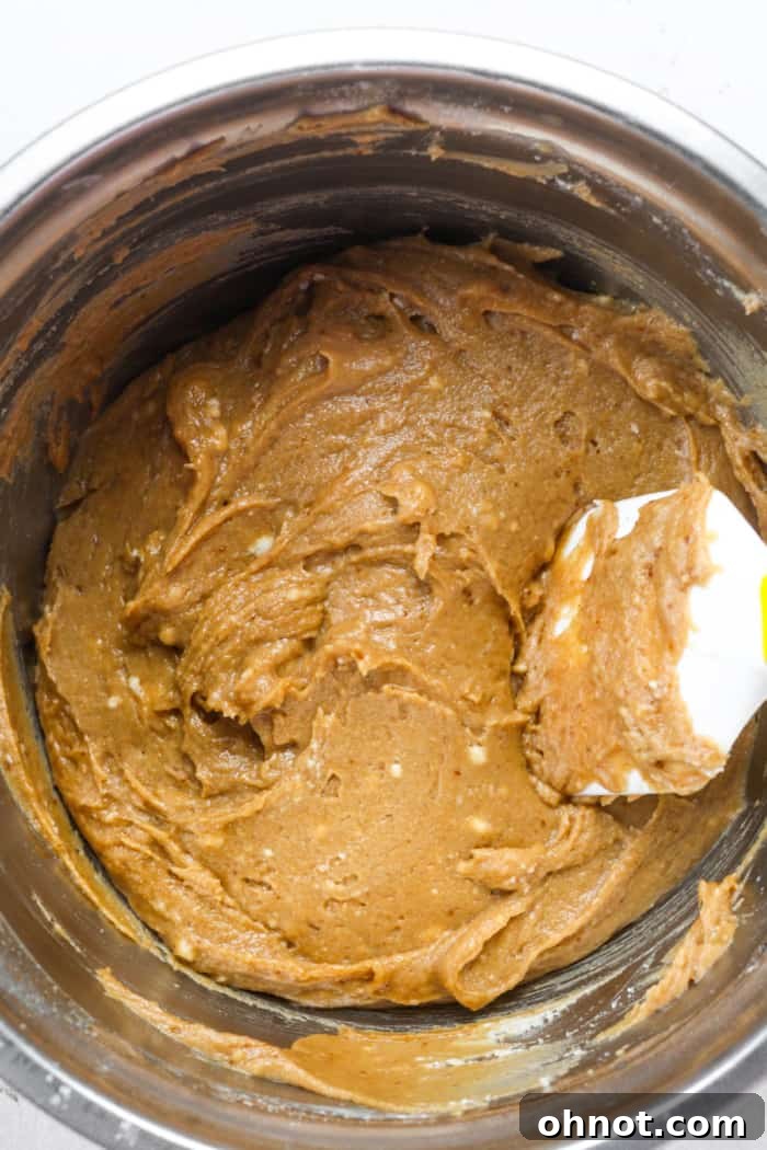 Thick sourdough muffin batter.