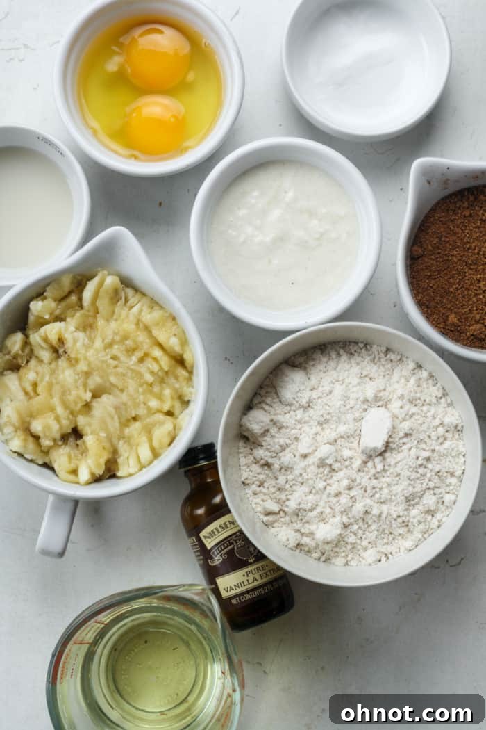 Mashed bananas and sourdough discard in a bowl.